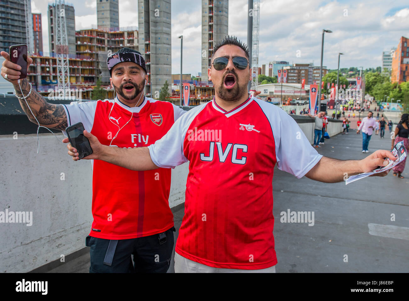 London, UK. 27th May, 2017. Chelsea and Arsenal fans arrive at Wembley Stadioum for the FA Cup Final. London 27 May 2017. Credit: Guy Bell/Alamy Live News Stock Photo