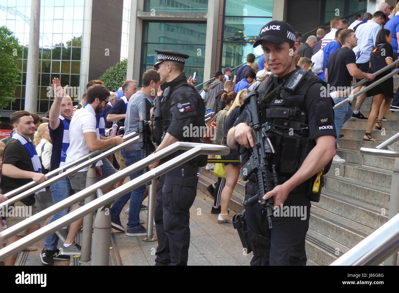 London, UK. 27th May, 2017. Police and armed police watch over FA Cup final fans at Wembley London Credit: Nigel Bowles/Alamy Live News Stock Photo