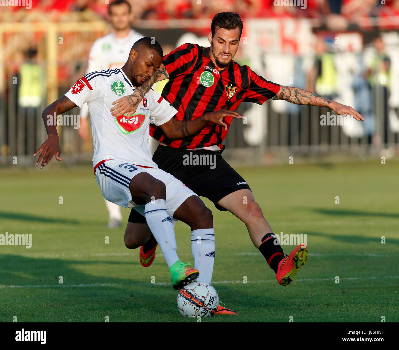 Budapest, Hungary. 27th May, 2017. Davide Lanzafame (L) of Budapest Honved battles for the ball with Paulo Vinicius #3 of Videoton FC during the Hungarian OTP Bank Liga match between Budapest Honved and Videoton FC at Bozsik Stadium on May 27, 2017 in Budapest, Hungary. Credit: Laszlo Szirtesi/Alamy Live News Stock Photo