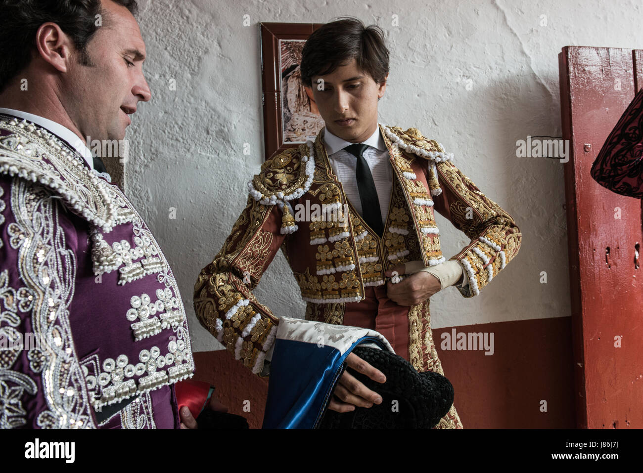 Caceres, Spain. 27th May, 2017. Peruvian bullfighter Roca Rey(center) and Antonio Ferrera (left) moments before of the bullfighting celebrated as part of the San Fernando Fair at the bullring in Cáceres, Spain Credit: Esteban Martinena Guerrero/Alamy Live News Stock Photo