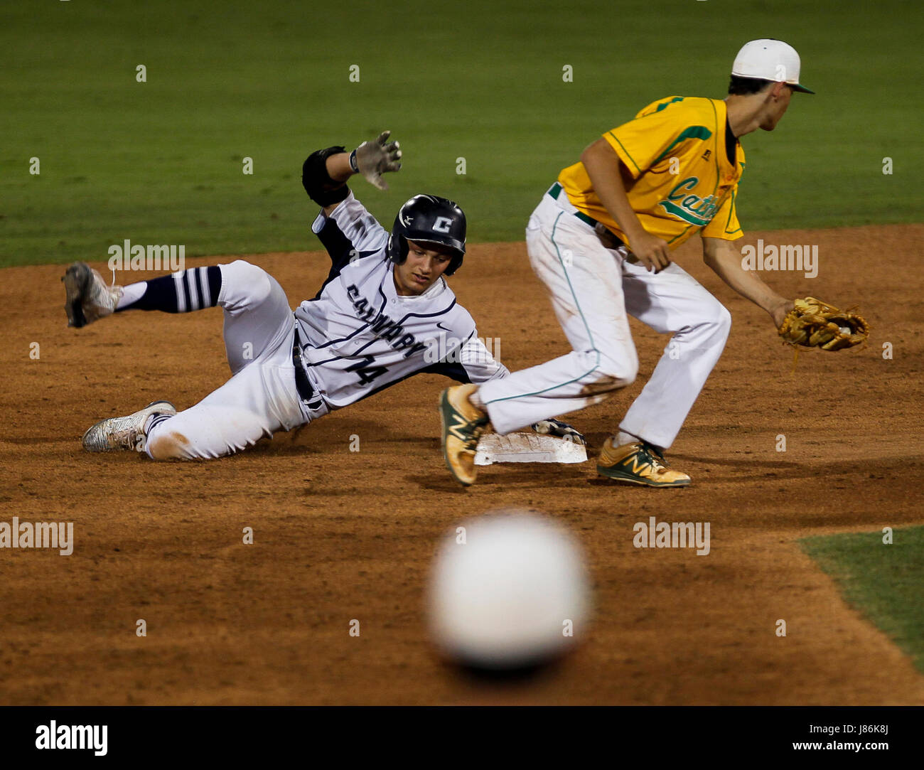 Fort Myers, Florida, USA. 27th May, 2017. MONICA HERNDON | Times.Nolan Hudi (14) of Calvary Christian, slides safe into second base during the third inning of the FHSAA class 4A baseball championship against Pensacola Catholic on Friday May 27, 2017 at Hammond Stadium in Fort Myers, Fla. Calvary defeated Pensacola Catholic 11 to 1. Credit: Monica Herndon/Tampa Bay Times/ZUMA Wire/Alamy Live News Stock Photo