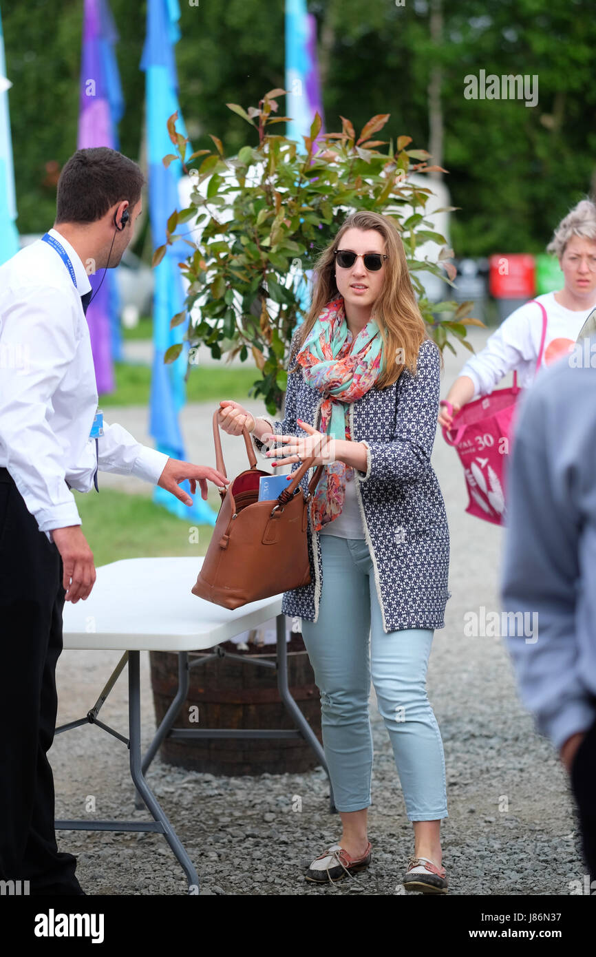 Hay Festival 2017 - Hay on Wye, Wales, UK - Sunday 28th May 2017 - Security bag checks at the entrance to the Hay Festival site - the Hay Festival celebrates its 30th anniversary in 2017 - the literary festival runs until Sunday June 4th. Credit: Steven May/Alamy Live News Stock Photo