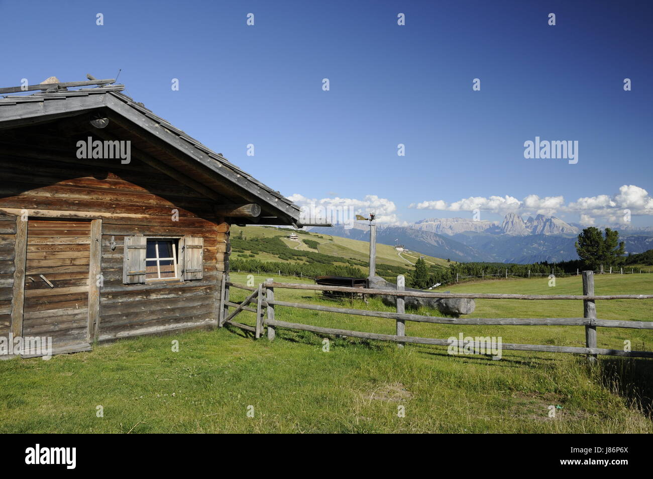 dolomites alps alp south tyrol lodge hut tree trees mountains alp sight view Stock Photo