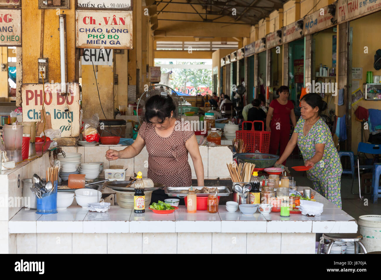 NHA TRANG, VIETNAM - JANUARY 20: Vietnamese style food court at the Xom Moi Market in Nha Trang on January 20, 2016 in Nha Trang, Vietnam. Stock Photo