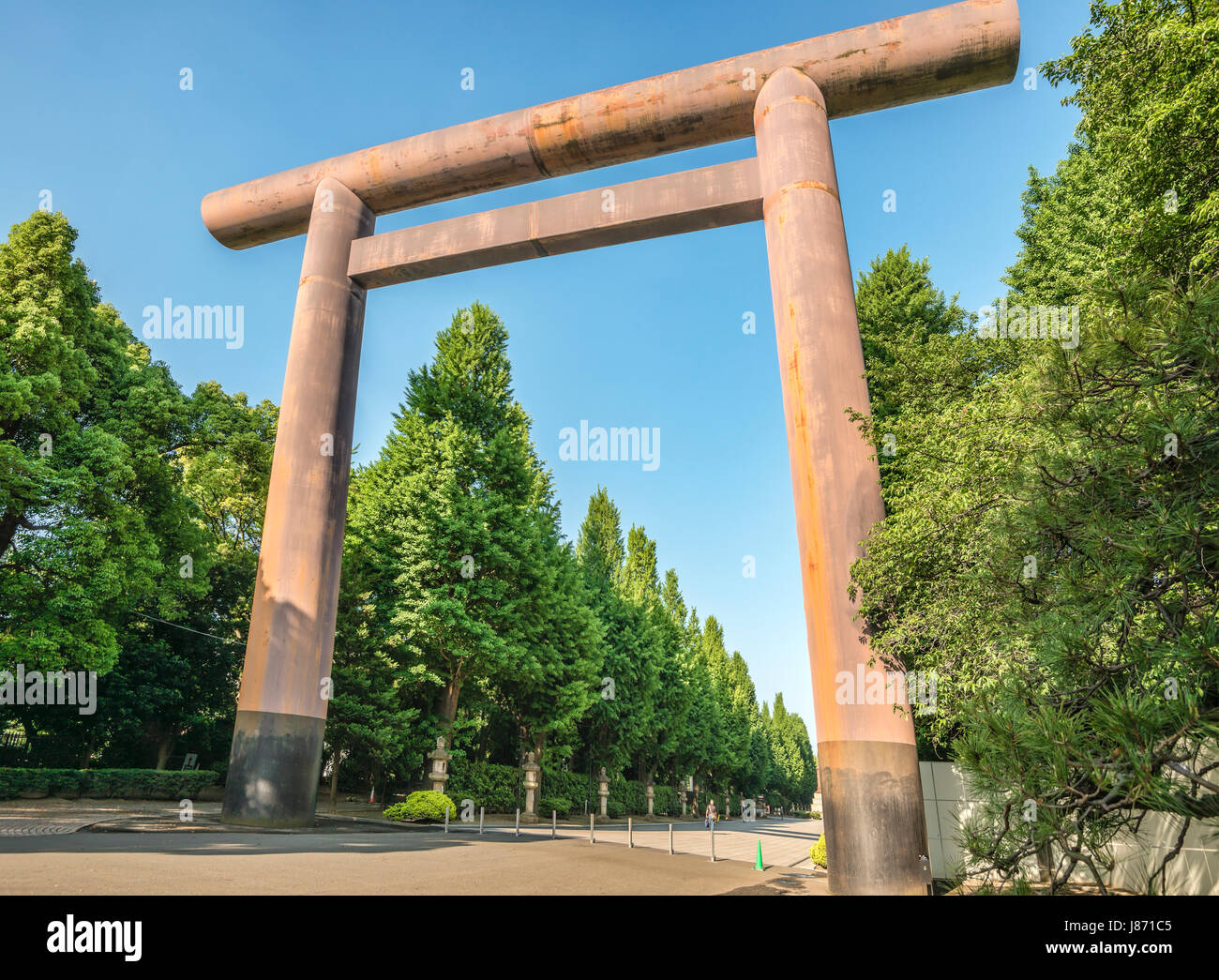 Daiichi Torii Shinto Gate and  Stone Pillar at the entrance The Imperial Shrine of Yasukuni, informally known as the Yasukuni Shrine, Tokyo, Japan Stock Photo