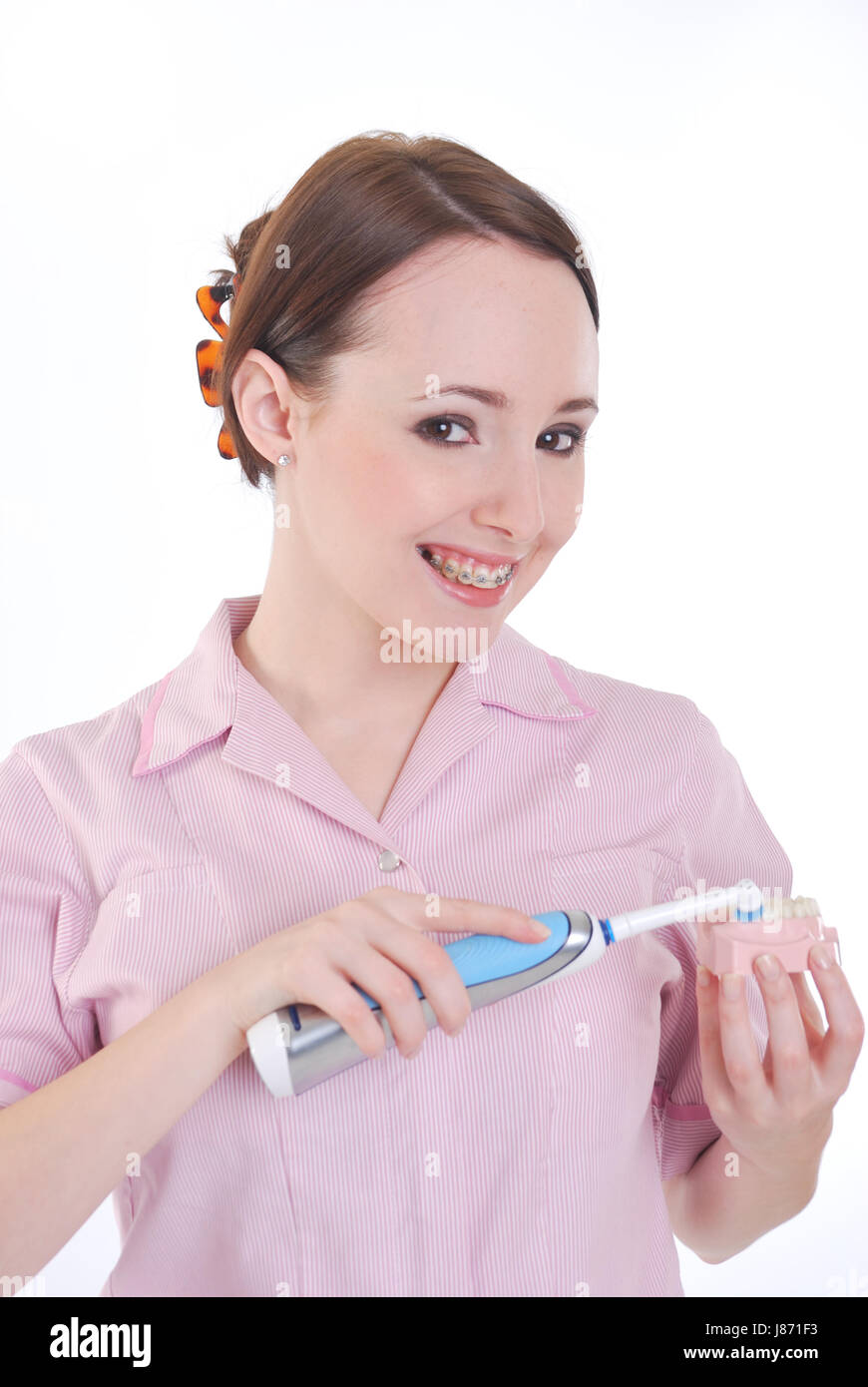 uniform, electric, toothbrush, dentures, nurse, maddening, pert, coquettish, Stock Photo