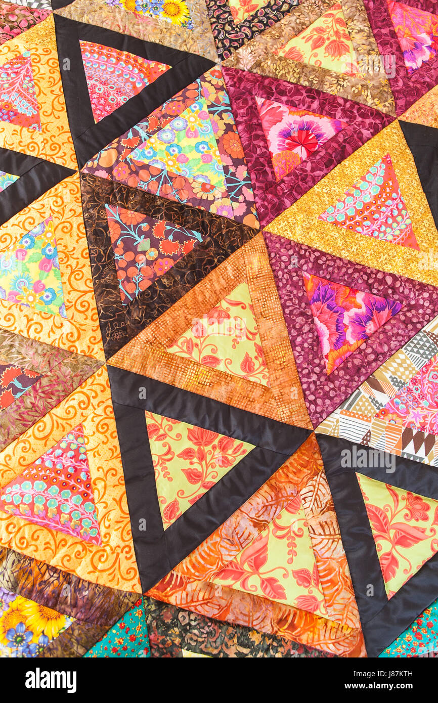 Patchwork quilt. Part of patchwork quilt as background. Handmade ...