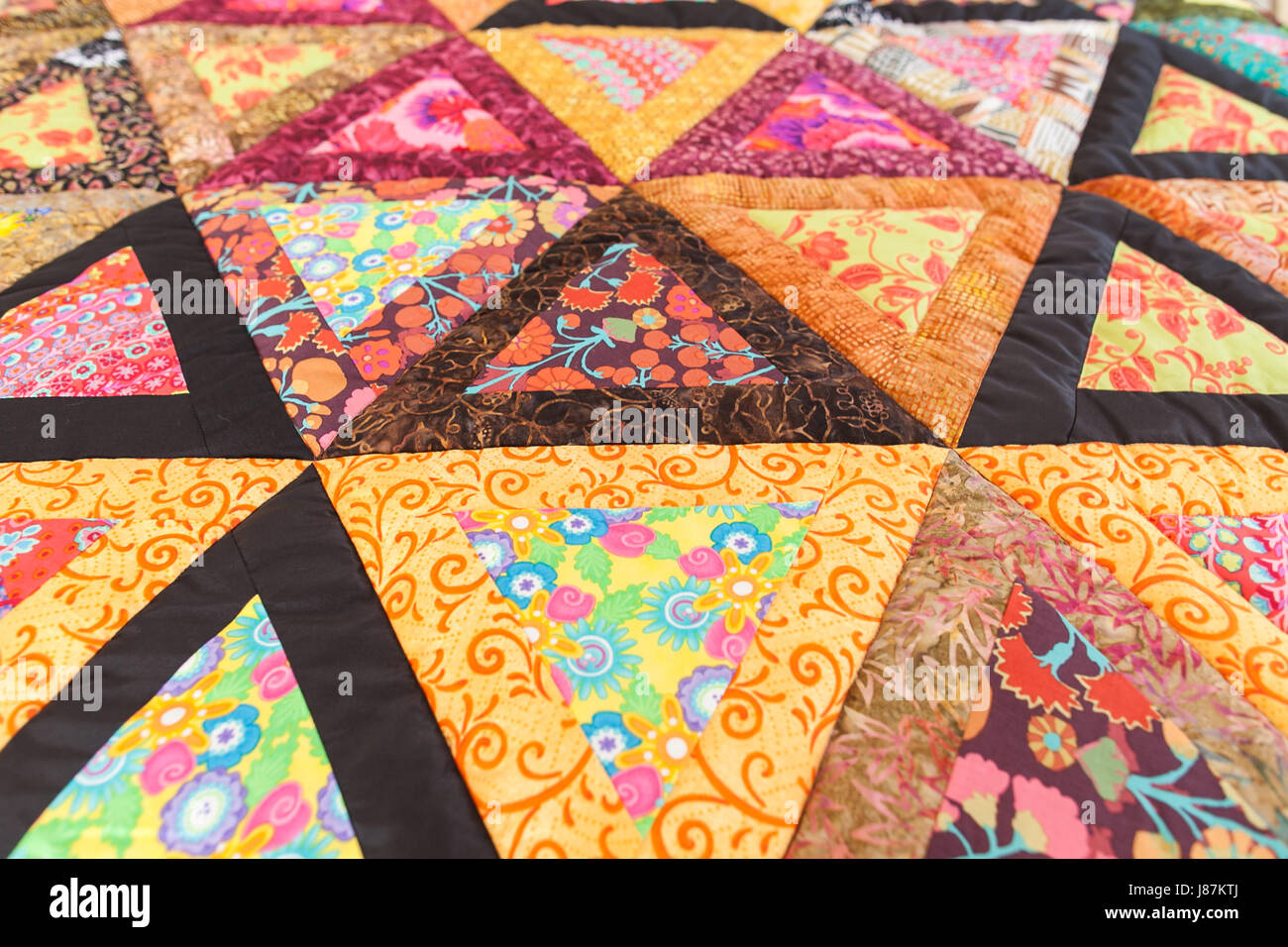 Patchwork quilt. Part of patchwork quilt as background. Handmade ...
