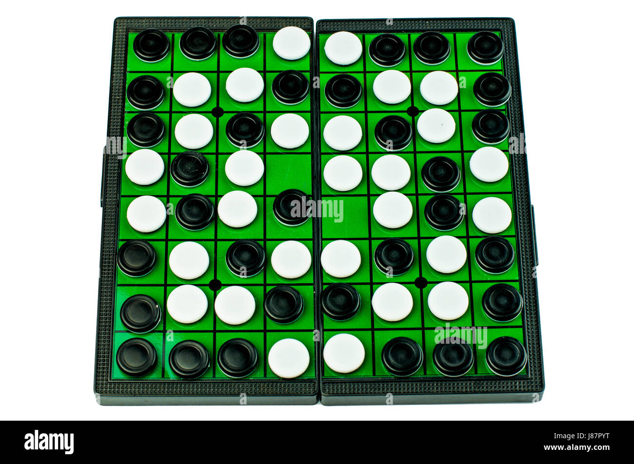 Black and White Othellos on Green Grid Othello Board Isolated Stock Photo