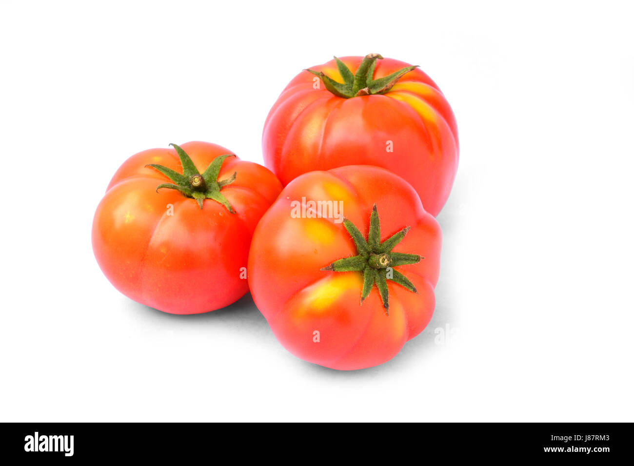 Fresh red tomato isolated on white background Stock Photo - Alamy