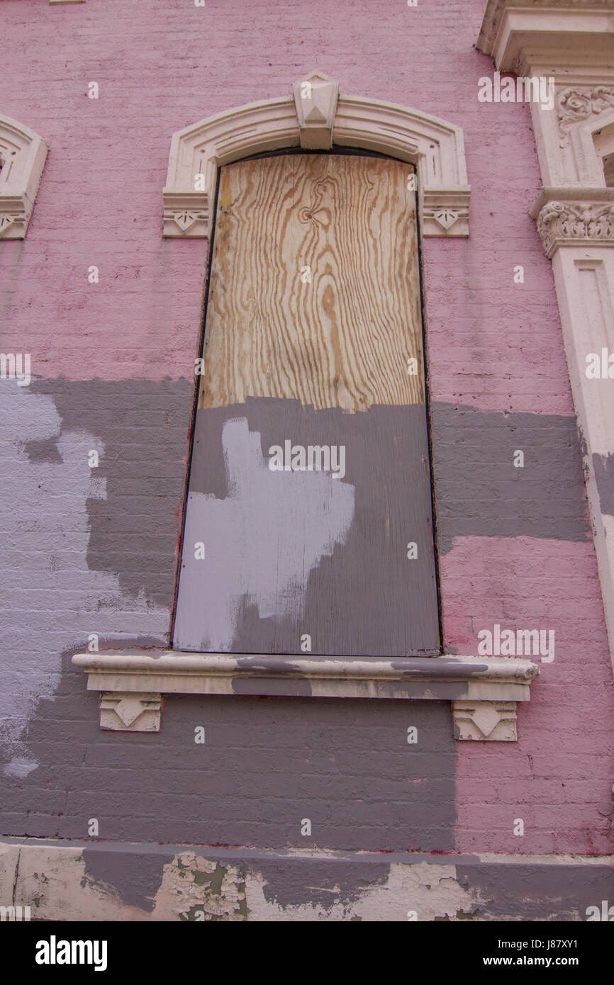 wood covered and painted windows. Stock Photo