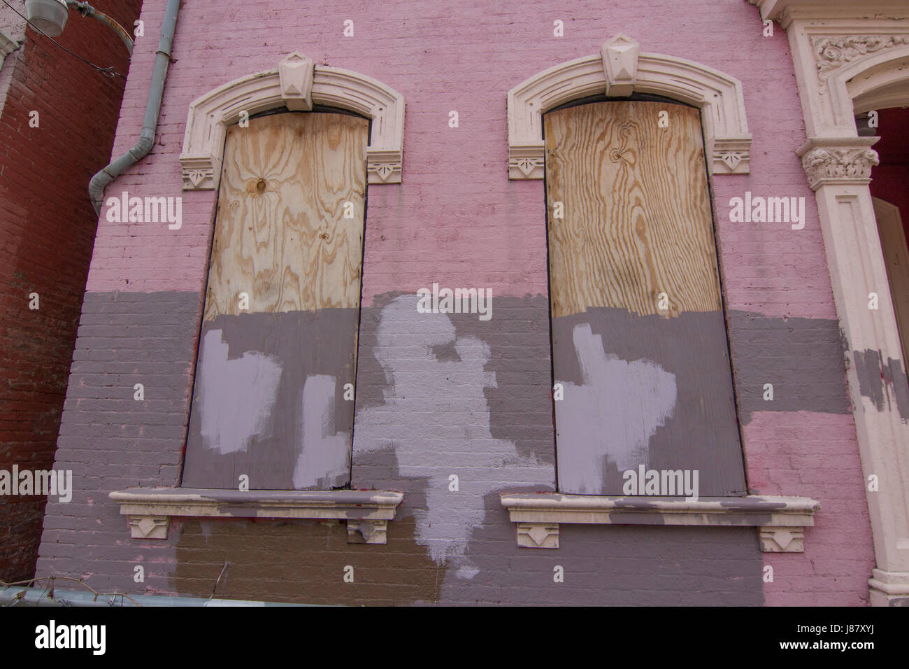 wood covered and painted windows. Stock Photo