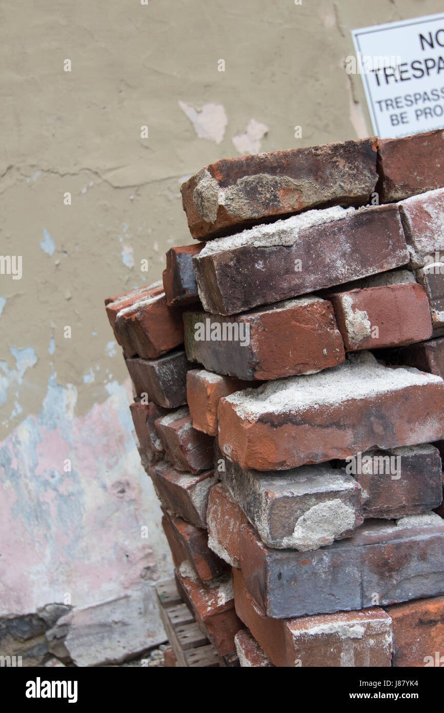 Pile of old bricks sitting on a pallet Stock Photo - Alamy