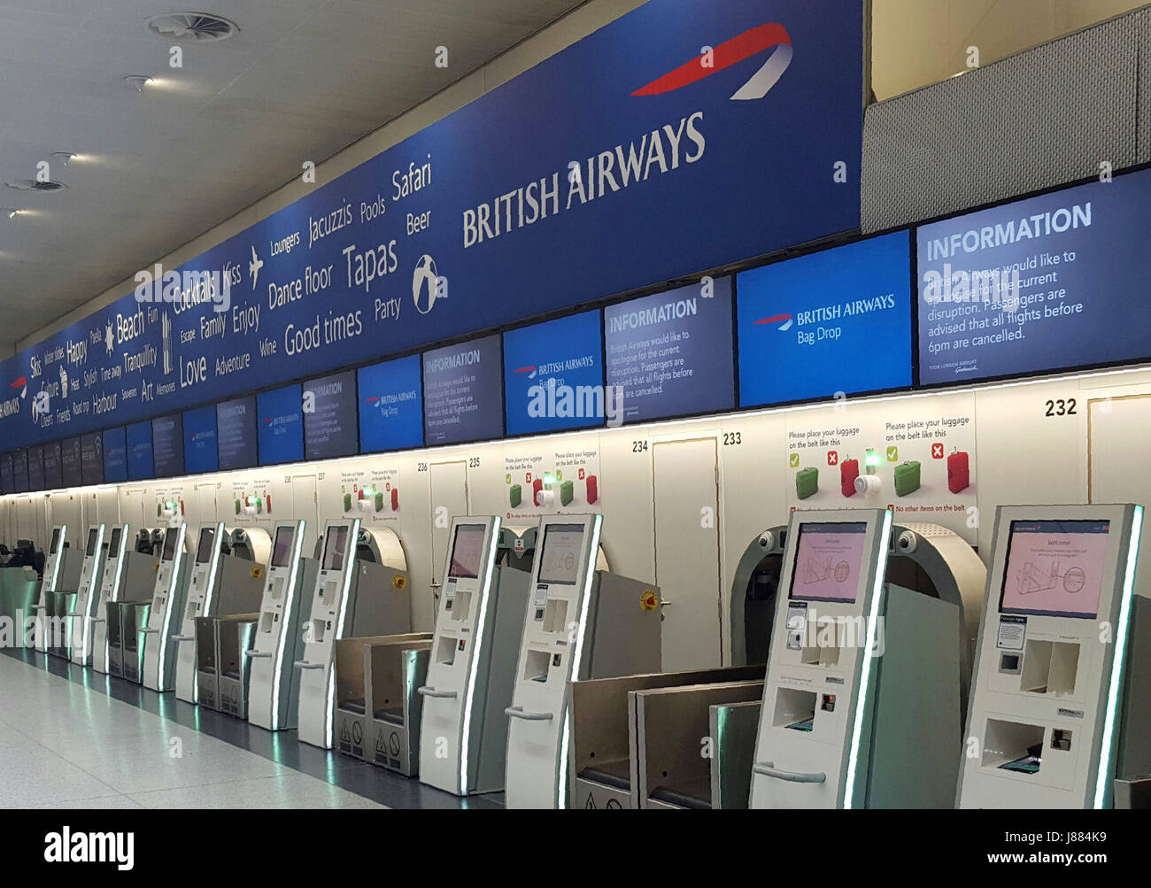 The empty British Airways check-in desk at Gatwick Airport. The airline says it has cancelled all flights leaving from Heathrow and Gatwick for the rest of today because of a 'major IT system failure'. Stock Photo