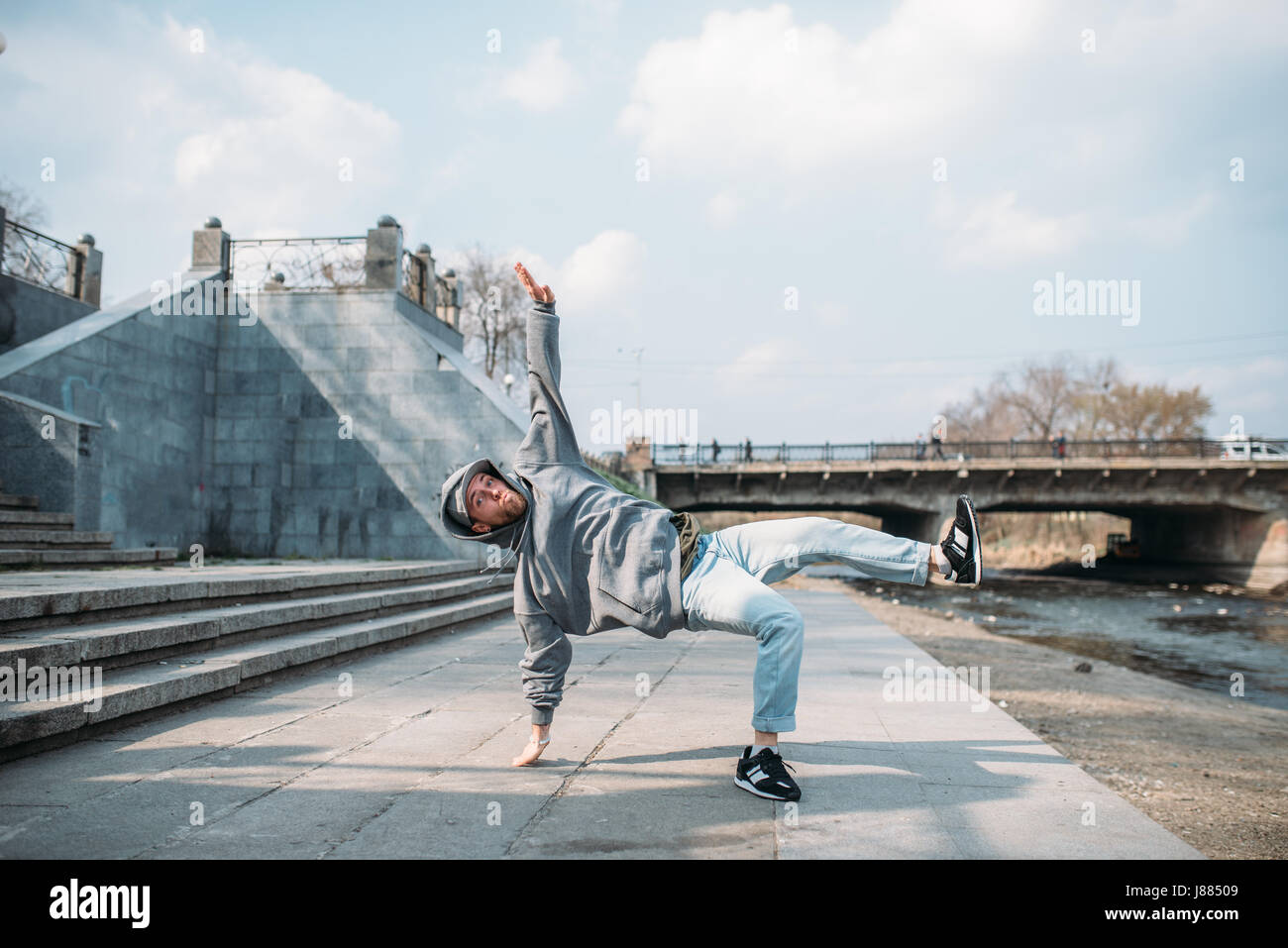 Dance performer, hip hop dancing on the street. Modern dance style