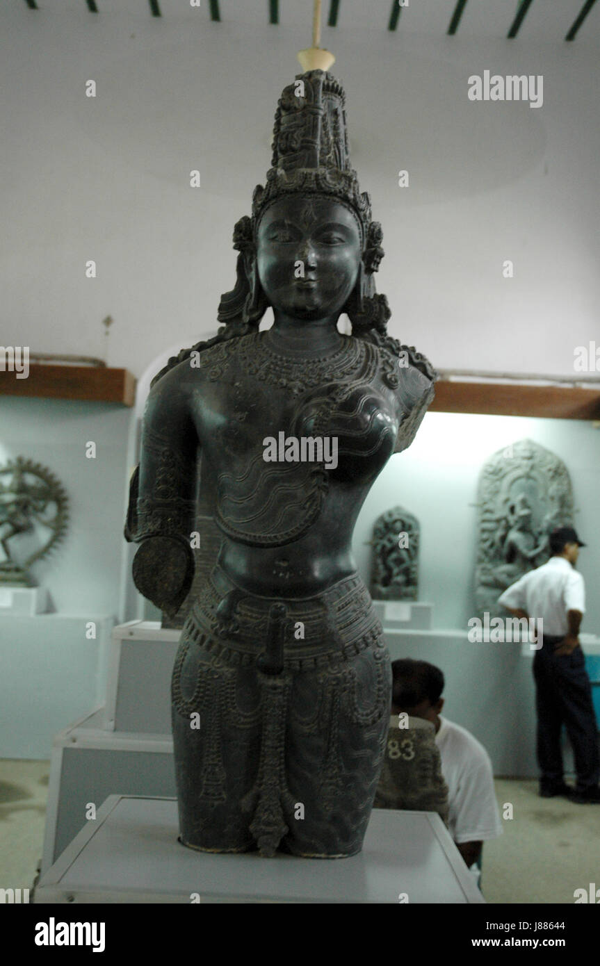The stone image of the Androgyne form of Shiva, called Ardhanarishvara, i.e half of Shiva and half of Parvati, now at Varendra Research Museum in Rajs Stock Photo