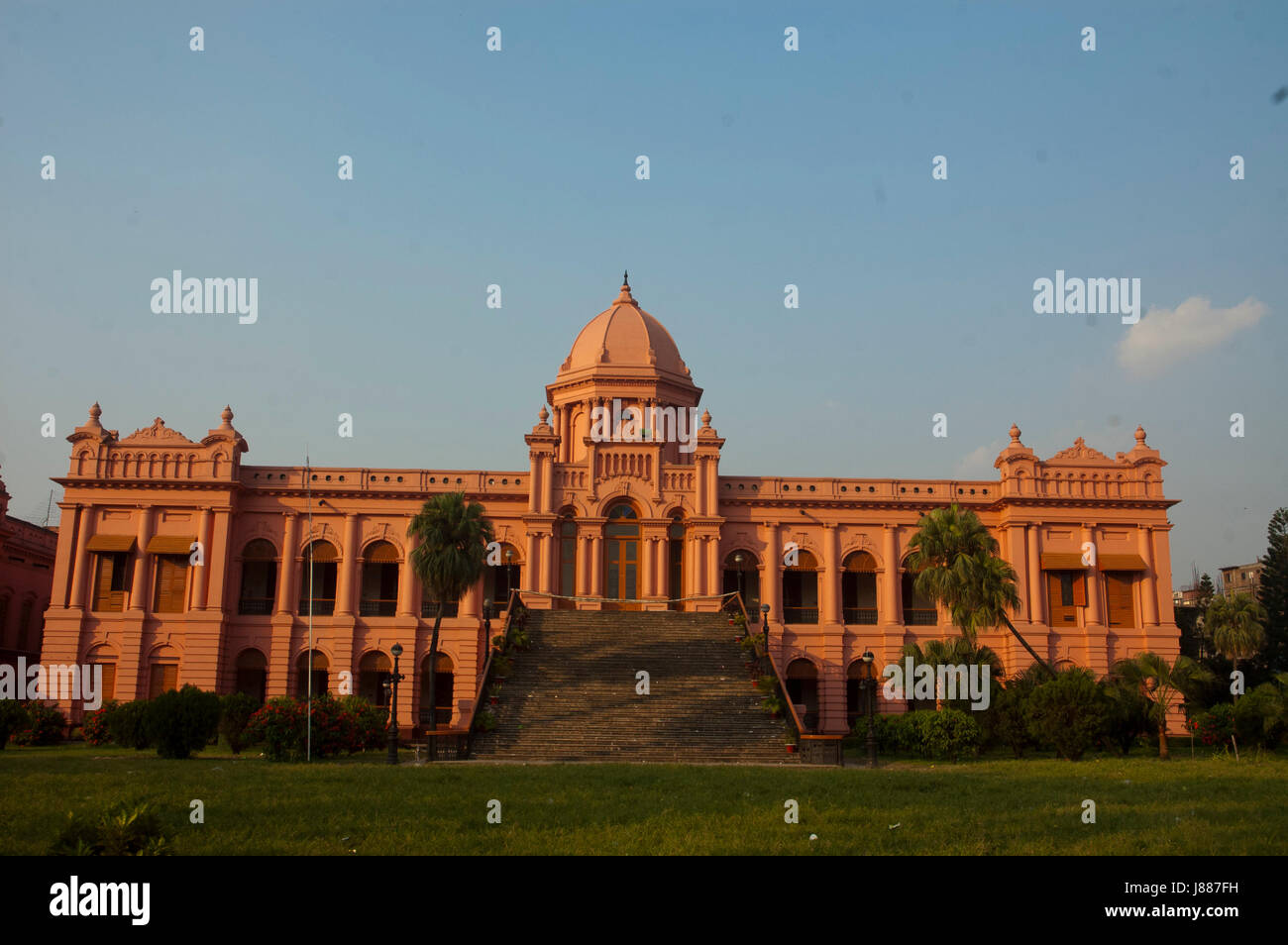 The historic Ahsan Manjil, is situated in Kumartoli, on the bank of the Buriganga river, in Dhaka, Bangladesh. It had been used as the residential pal Stock Photo