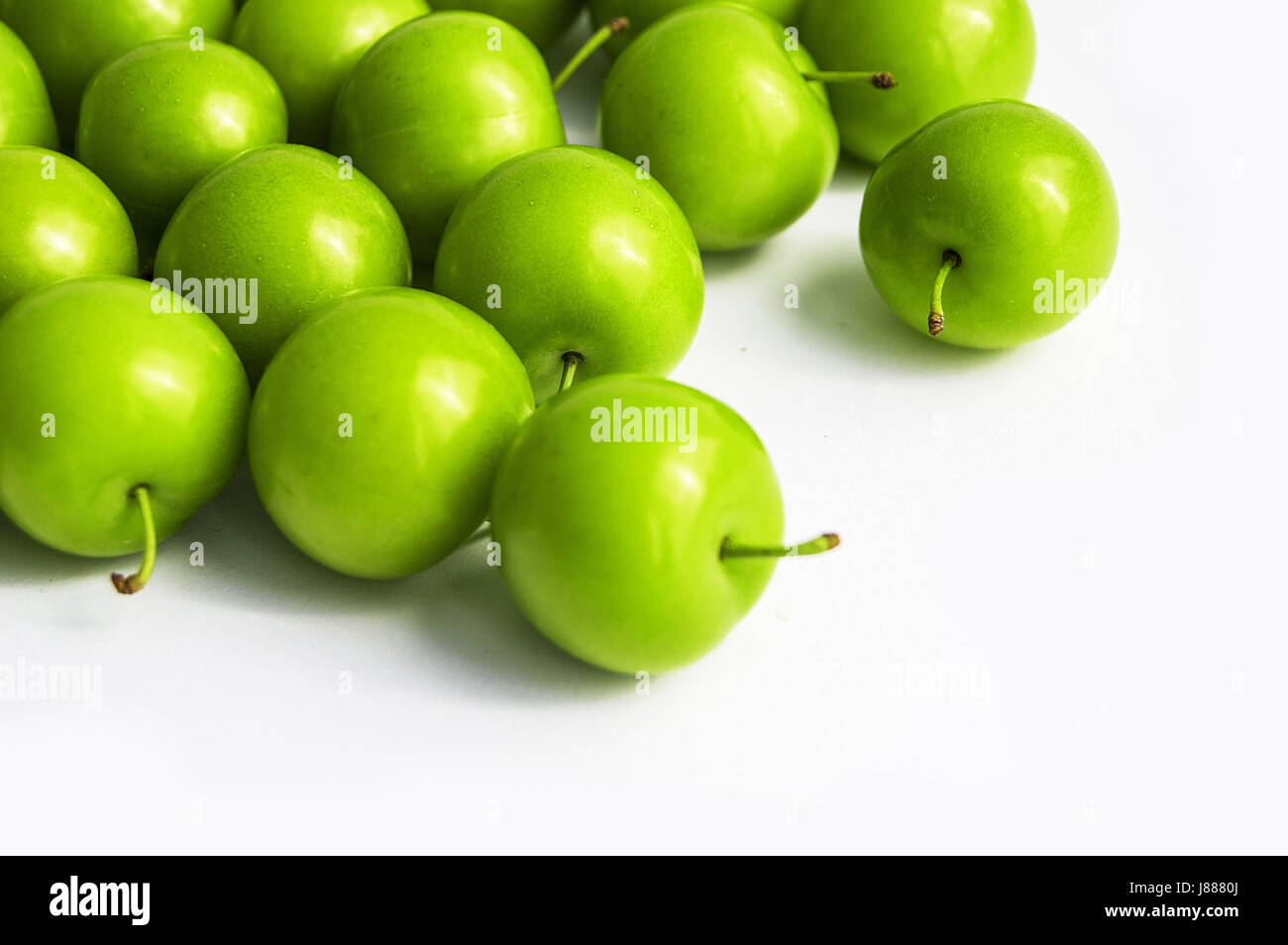 Sour plum pictures on white ground, wonderful sour plums Stock Photo