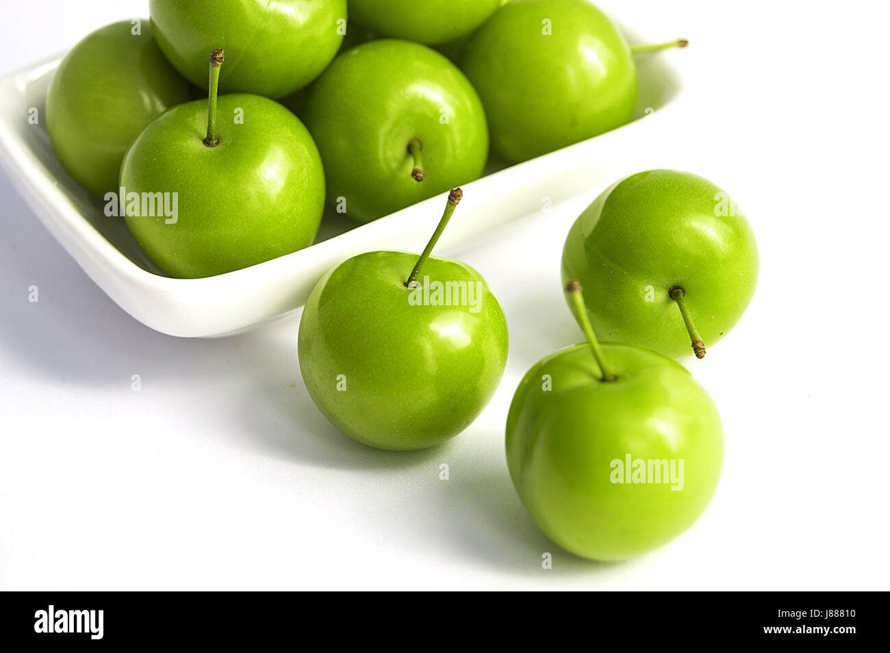 Sour plum pictures on white ground, wonderful sour plums Stock Photo