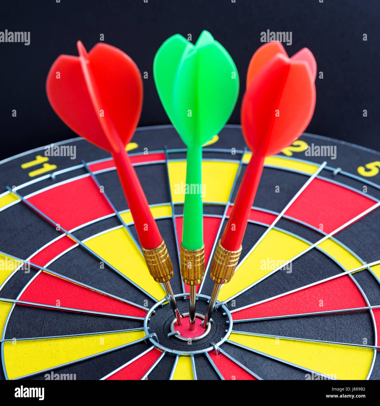 Three arrows hitting center target hi-res stock photography and images ...