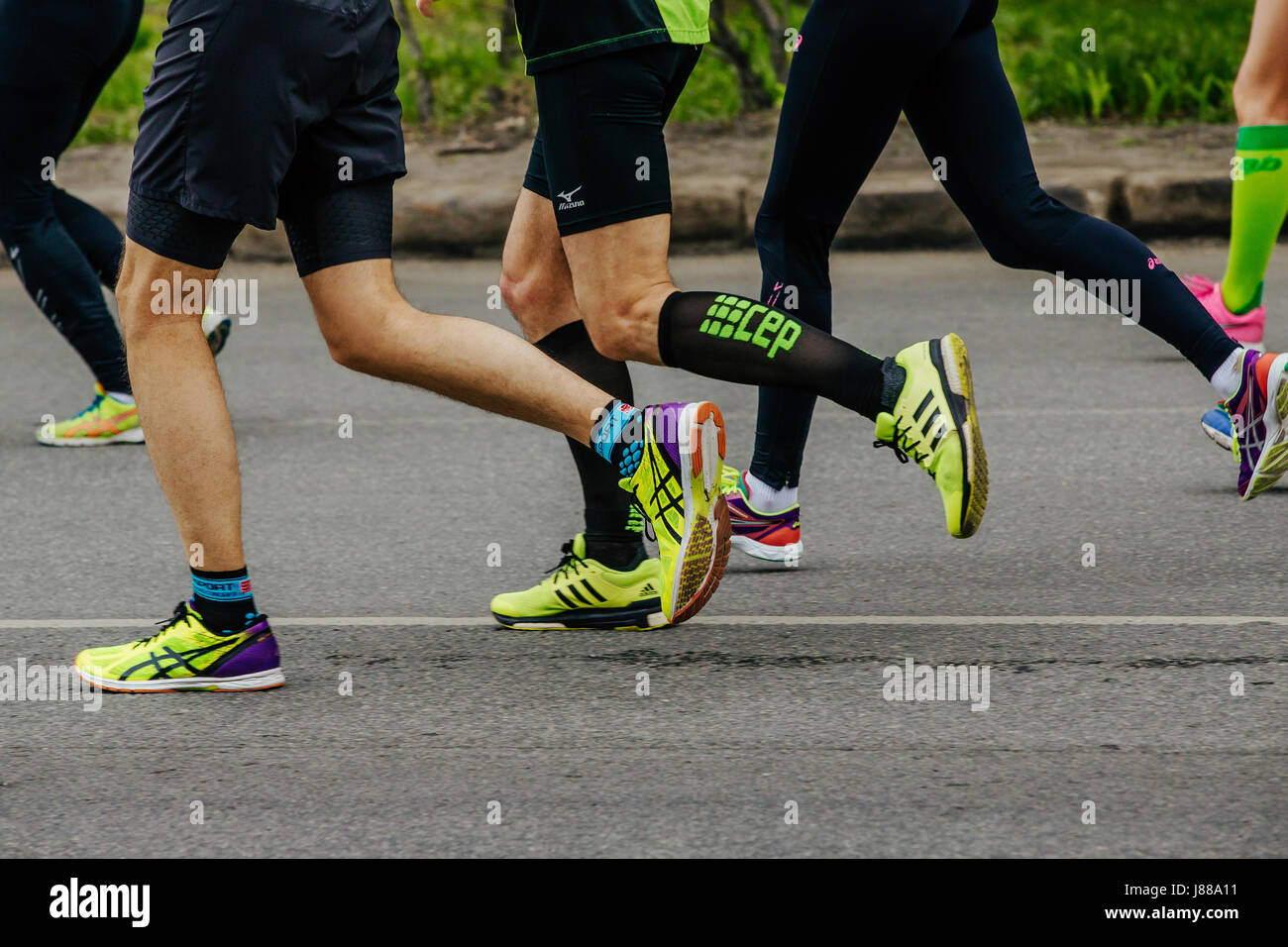 running barefoot on asphalt