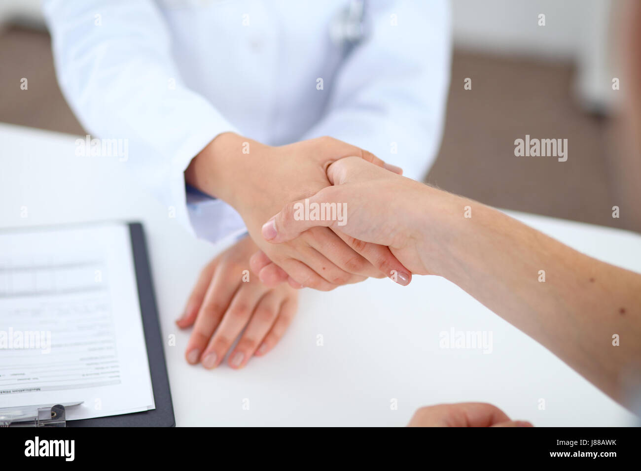 Partnership, trust and medical ethics concept. Doctor and patient