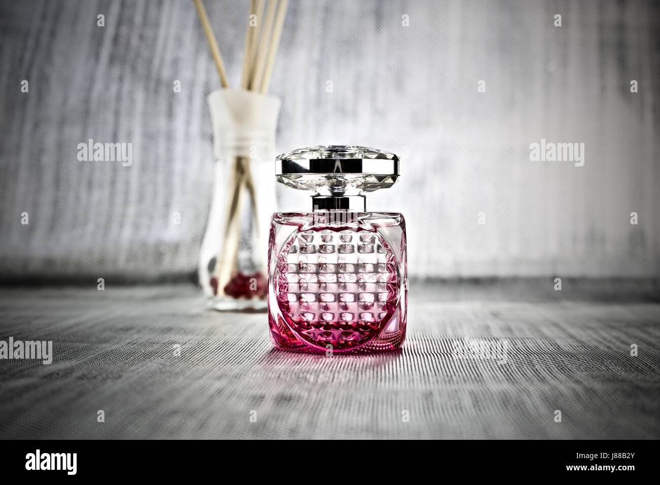 Luxury fragrance in pink square bottle 