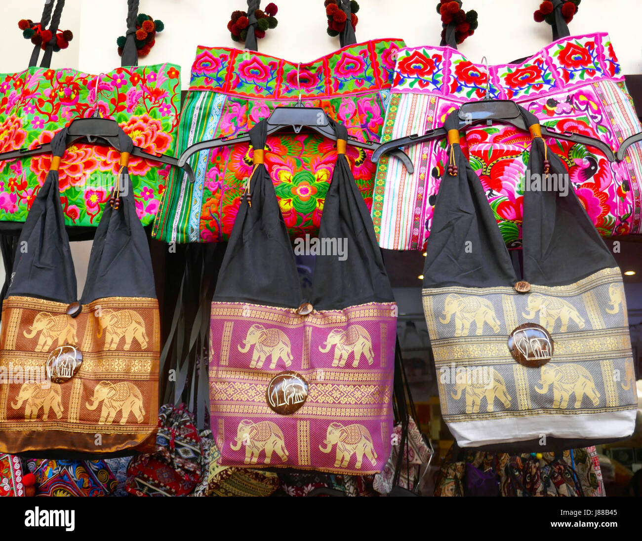 Cheerful bags on sale at Siem Reap, Cambodia Stock Photo - Alamy, image size:1300x1096