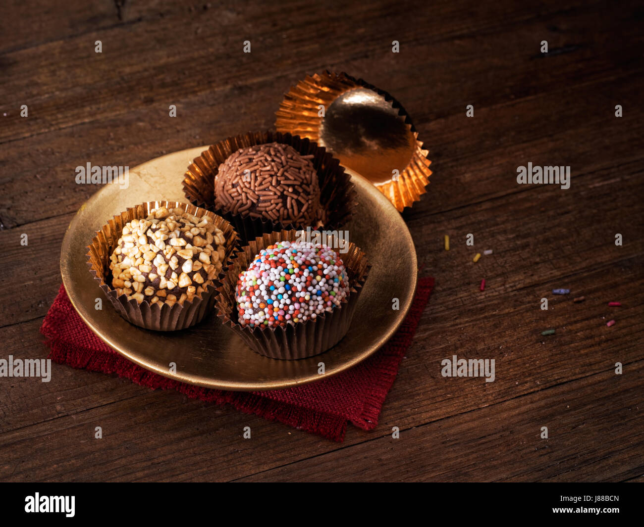 Tempting hand made chocolate truffles. Delicious treats. Irresistible! Stock Photo