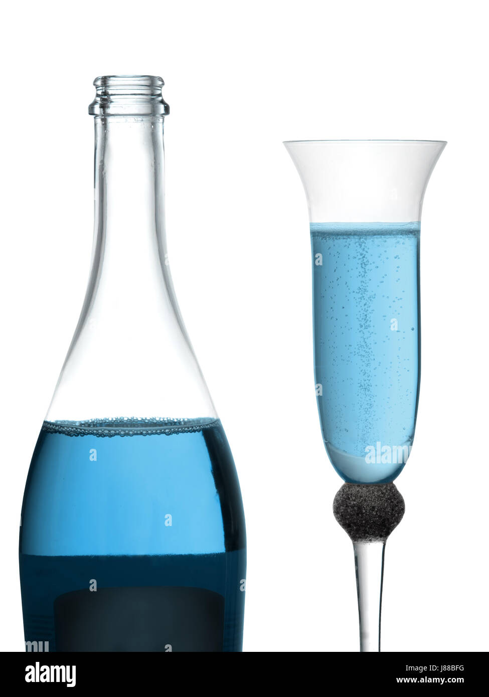 Blue bubbly, bottle and glass. Celebratory drink. Stock Photo