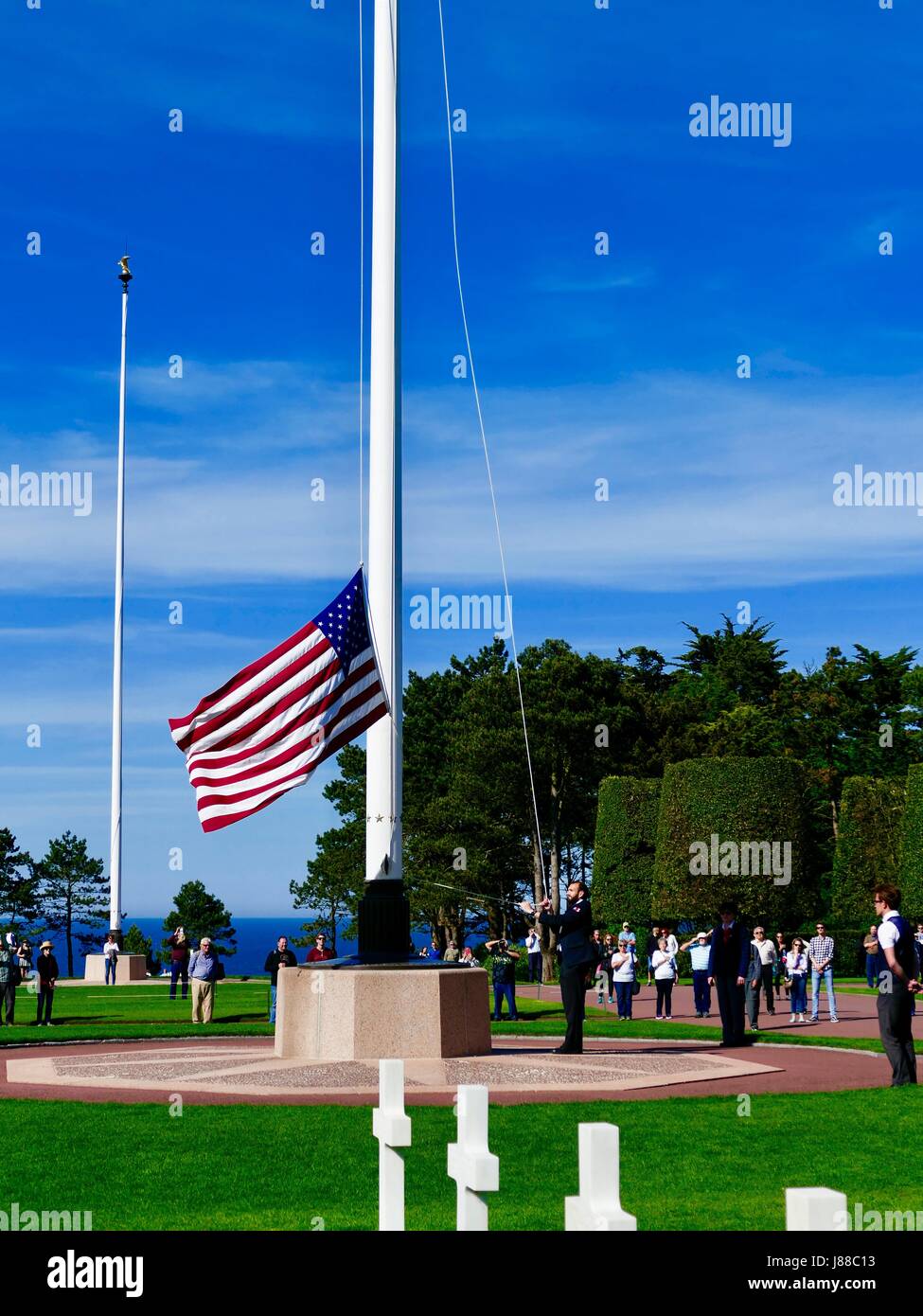 Normandy American Cemetery and Memorial, Flag Lowering Ceremony, 21 May, 2017, Colleville-sur-Mer, France. Stock Photo
