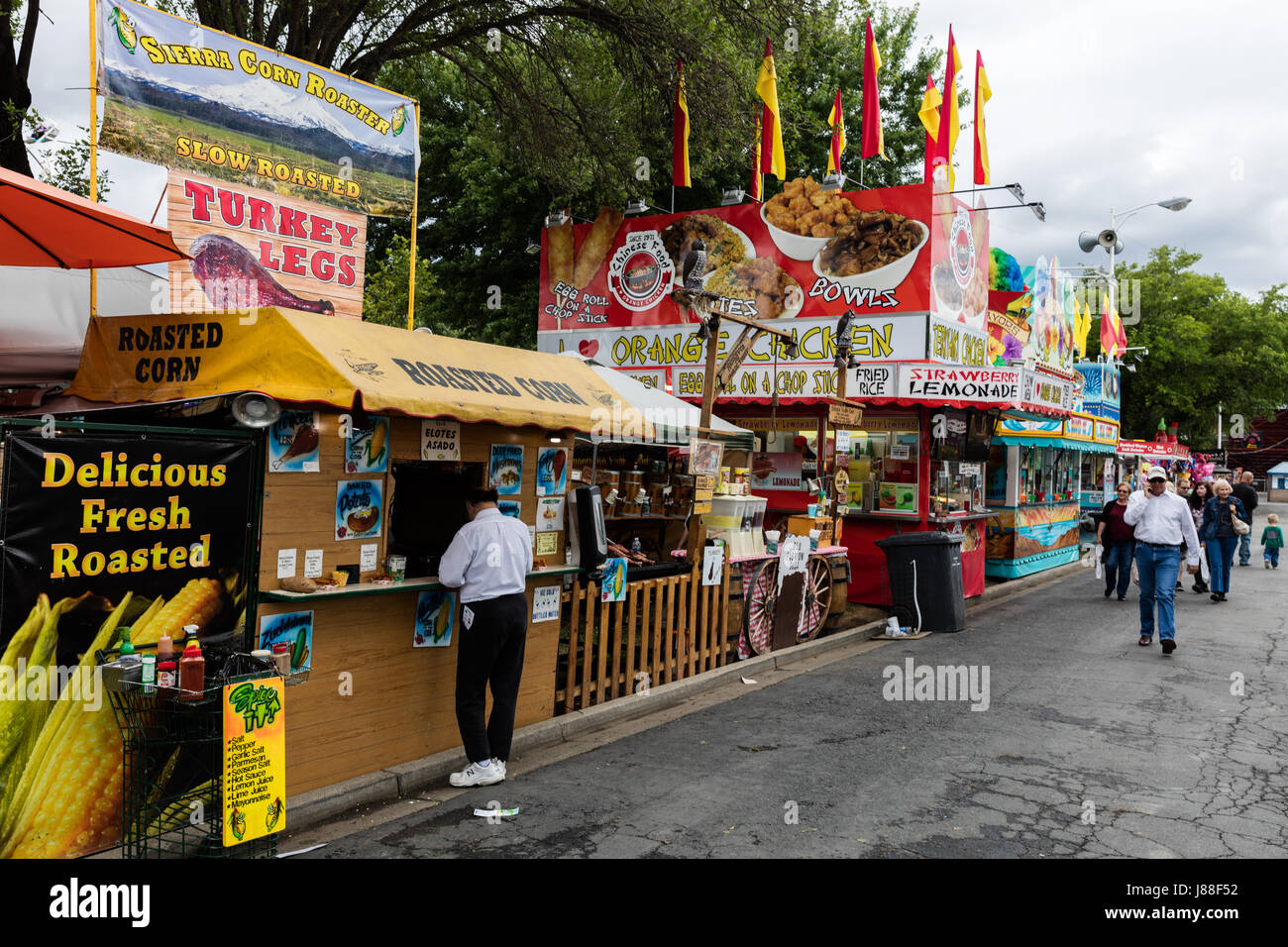 Snack food stands at a county fair. Stock Photo