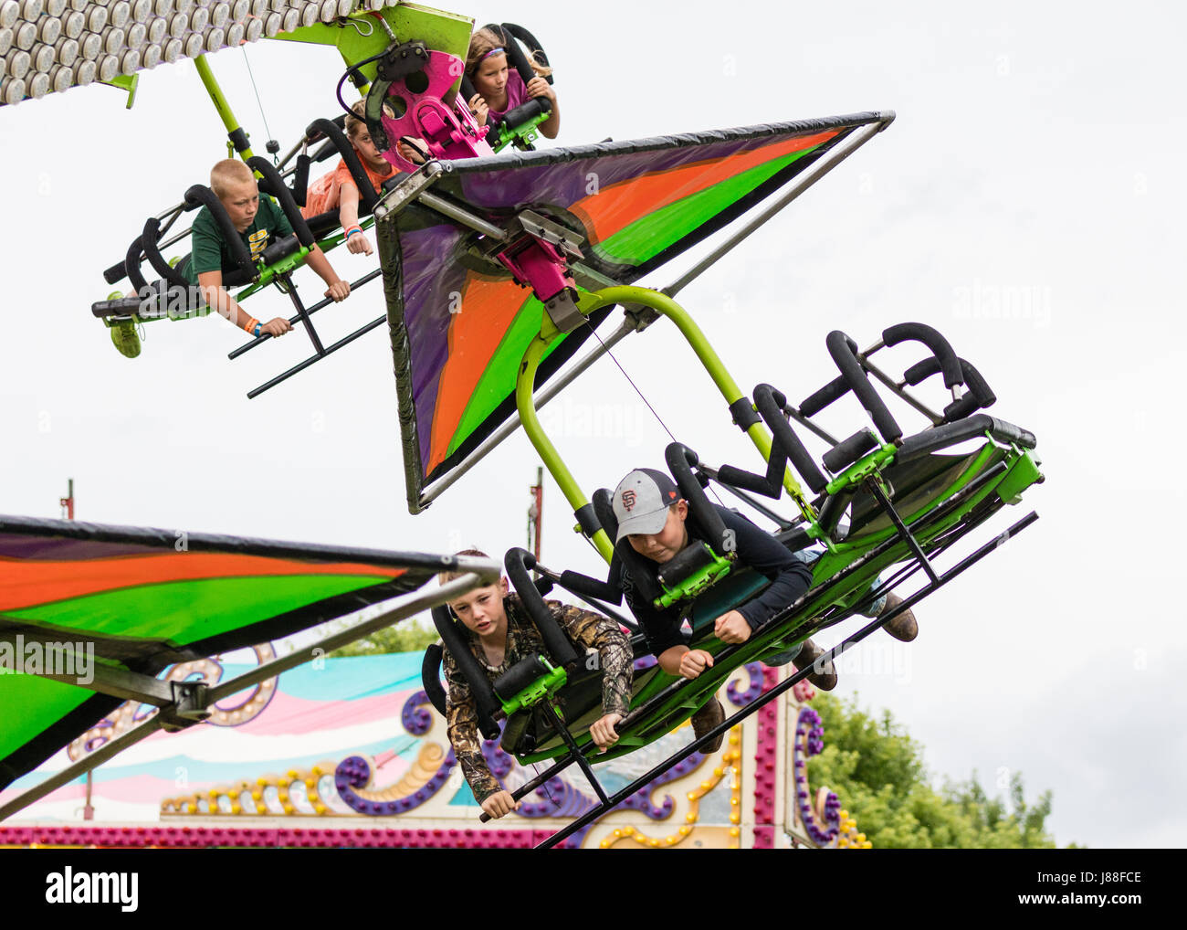 Hang glider ride at the county fair Stock Photo Alamy