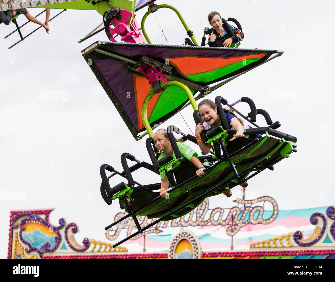 Hang glider ride at the county fair Stock Photo Alamy