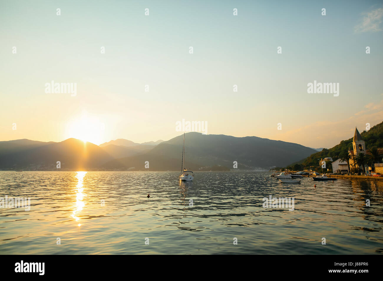 Yacht in the sea at sunset. Silhouette of a yacht on the background of ...