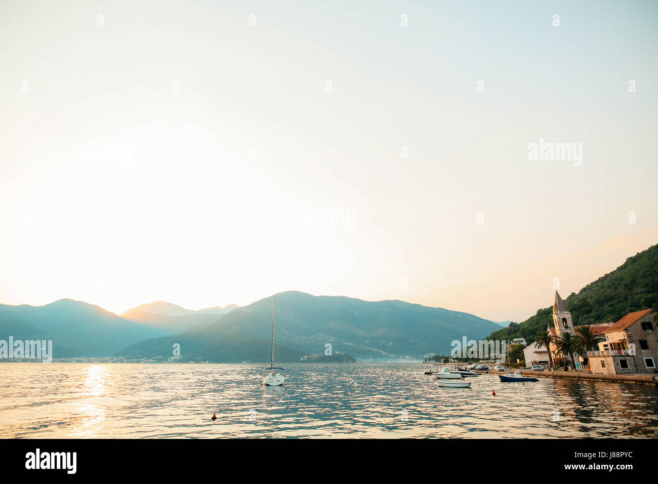 Yacht in the sea at sunset. Silhouette of a yacht on the background of ...