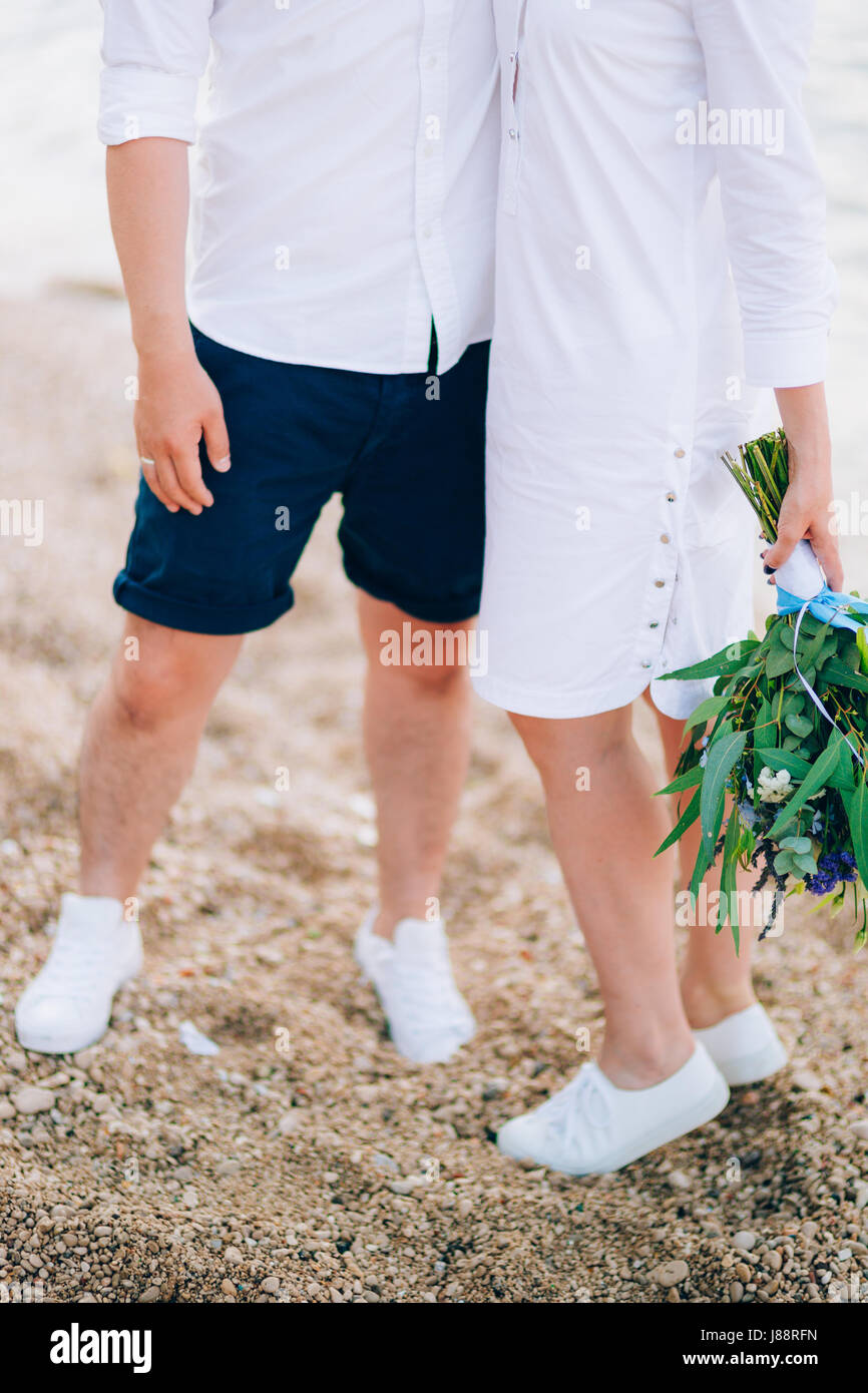 Wedding bridal bouquet of roses, lisianthus, lavender, Gypsophila, Verdure Italian in the hands of the bride. Wedding in Croatia, Dubrovnik. Stock Photo