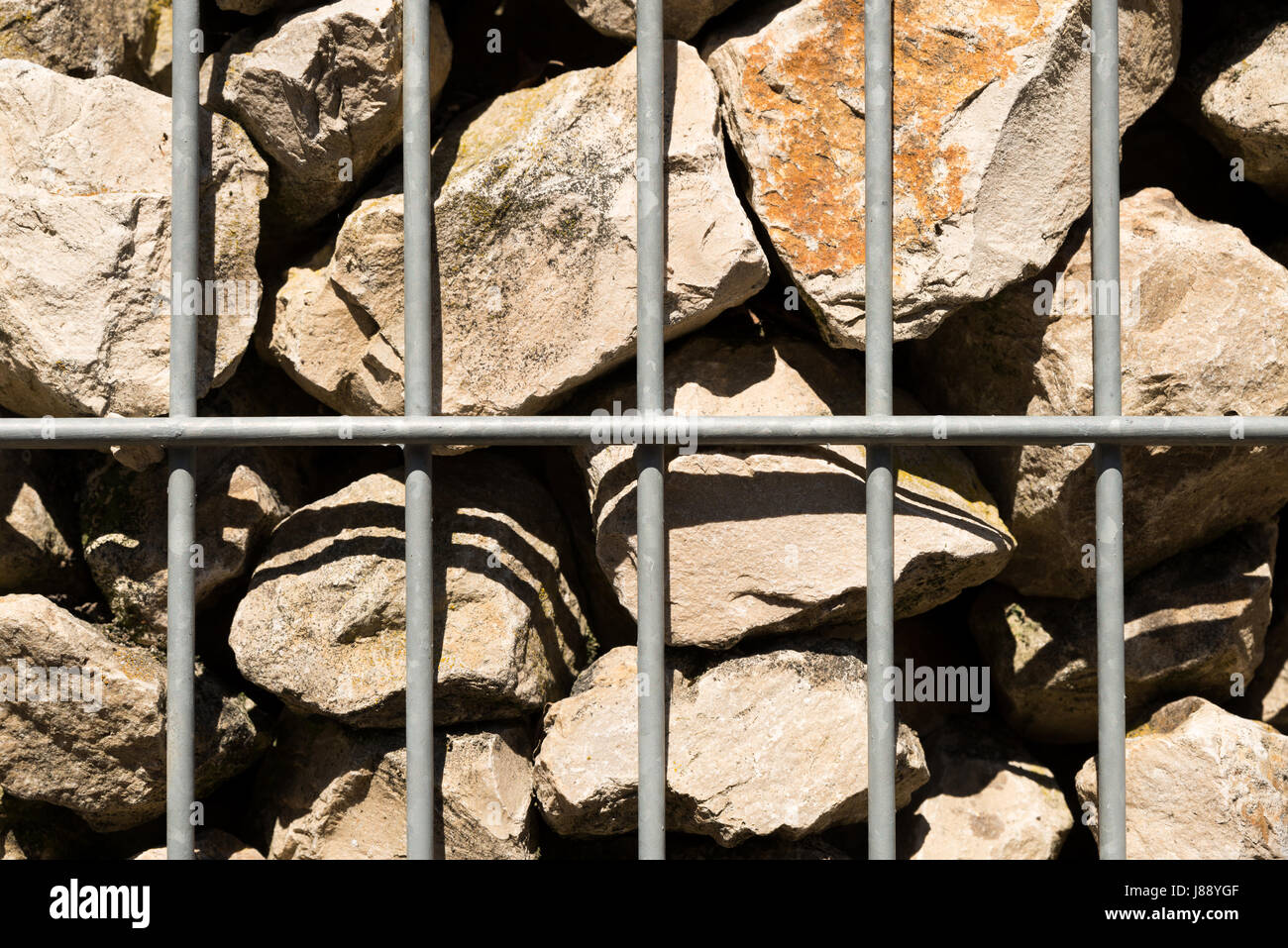 view of a metal cage for stones Stock Photo Alamy