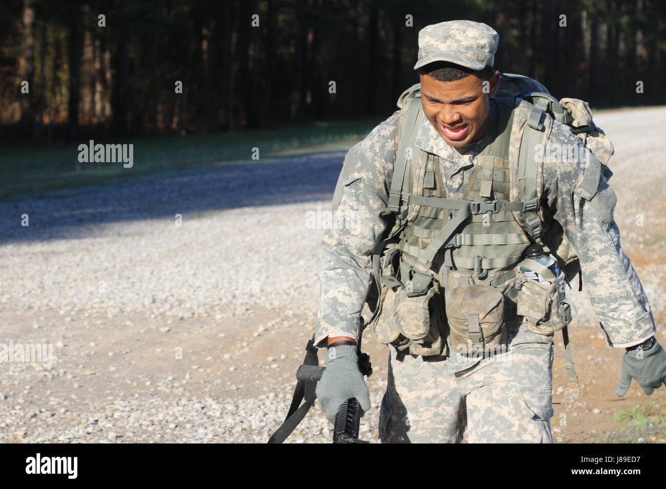 Soldiers compete in a 12-mile ruck march during the Mississippi ...