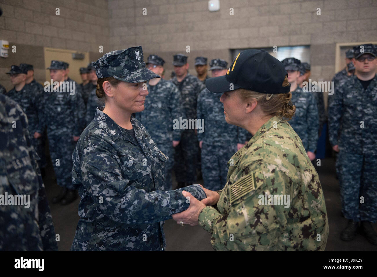 170520-N-QP351-066 INDIANAPOLIS (May 20, 2017) Rear Admiral Linda Wackerman, Deputy Commander, U.S. Naval Forces Southern Command, 4th Fleet, visits with Sailors from Navy Operational Support Center Indianapolis during an Admirals Call. Wackerman who also serves as the flag mentor for NOSC Indianapolis, held an all-hands Q&A session for E-6 and below Sailors to address upcoming changes and get feedback regarding Navy-related issues they feel need to be improved. (U.S. Navy photo by Mass Communication Specialist 2nd Class (SW/EXW/AW/SC) J. Michael Schwartz) Stock Photo