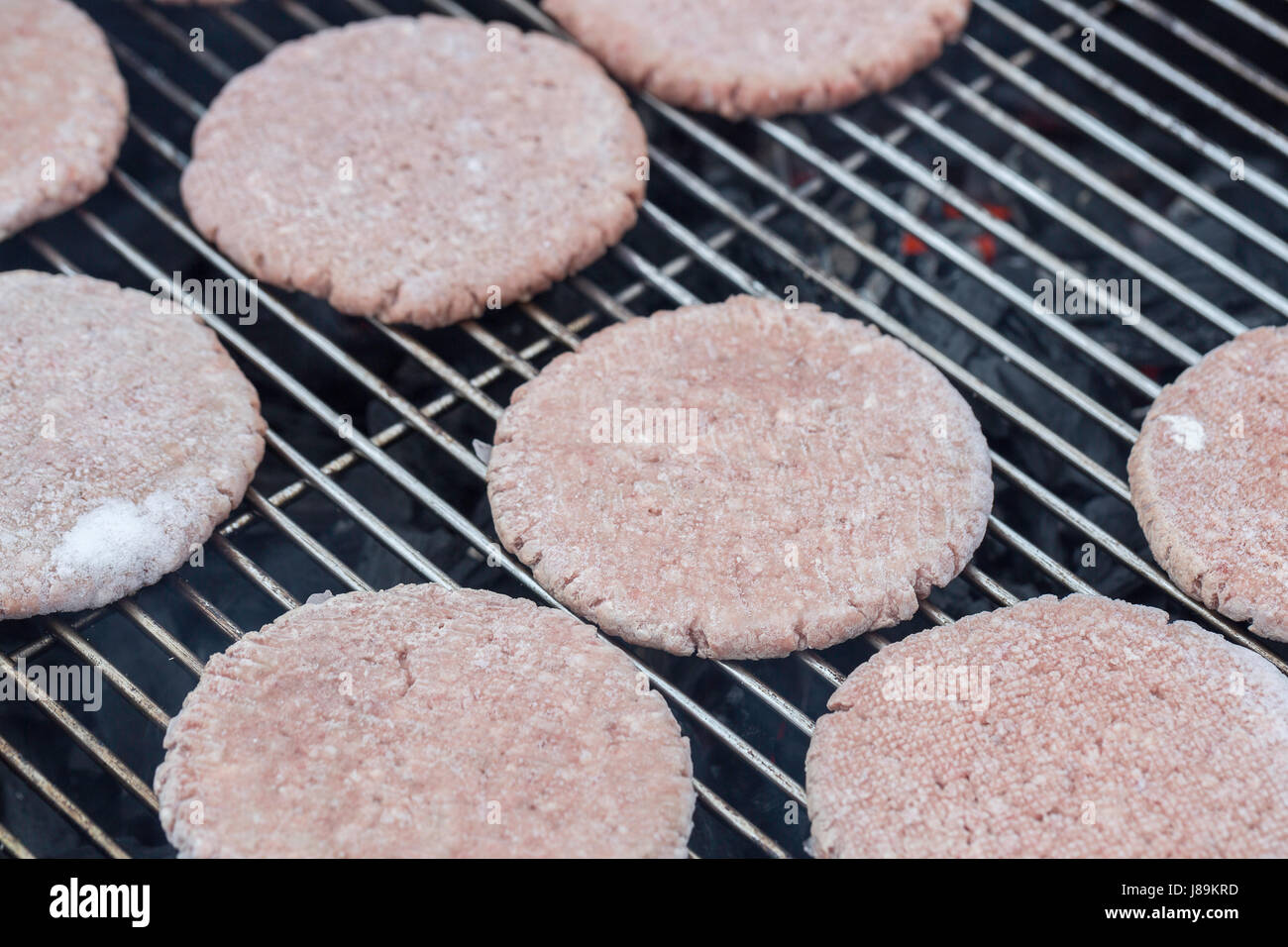 Frozen Hamburger Patties on Barbecue Stock Photo Alamy