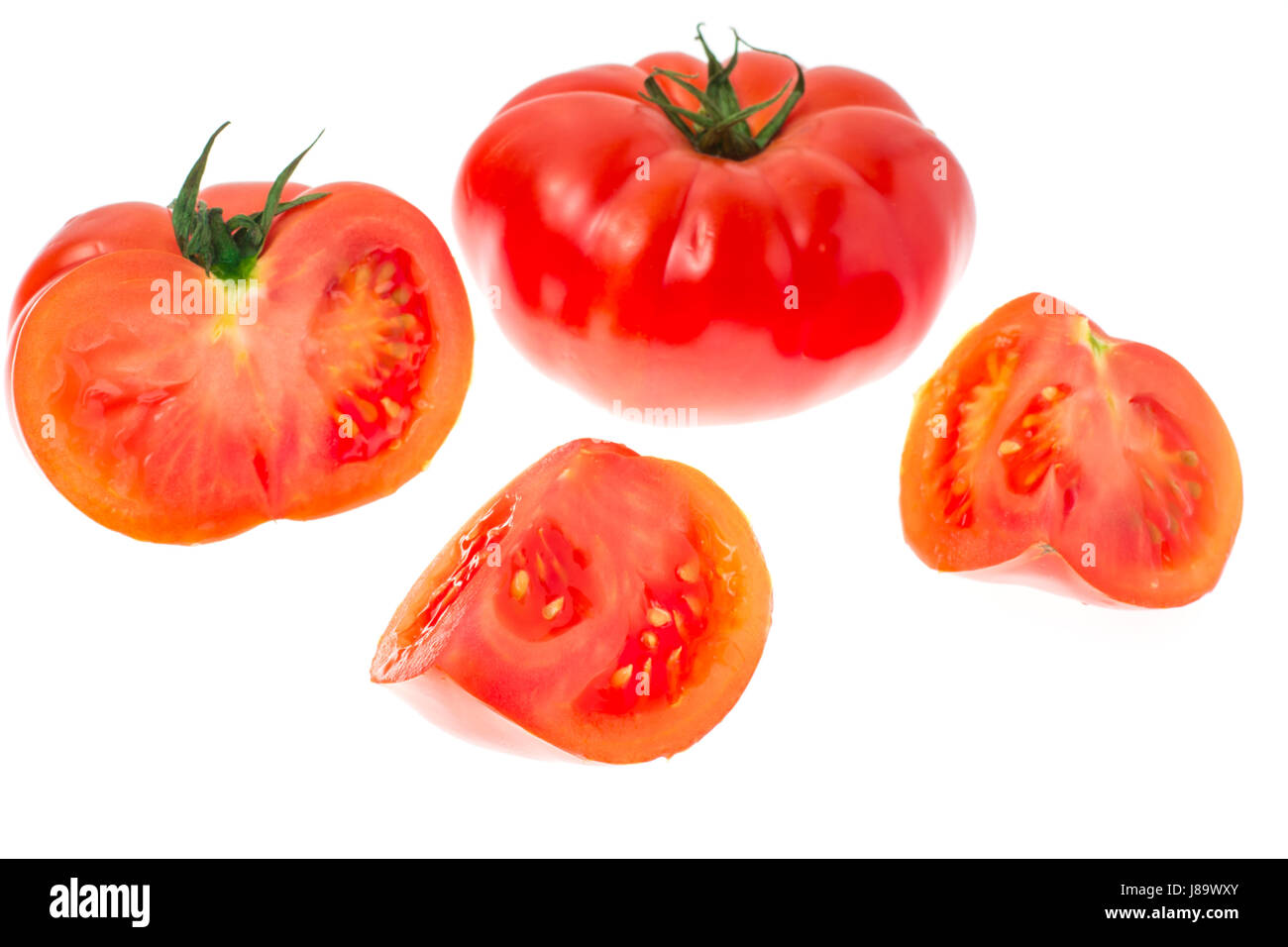 Red tomato isolated on white background Stock Photo - Alamy