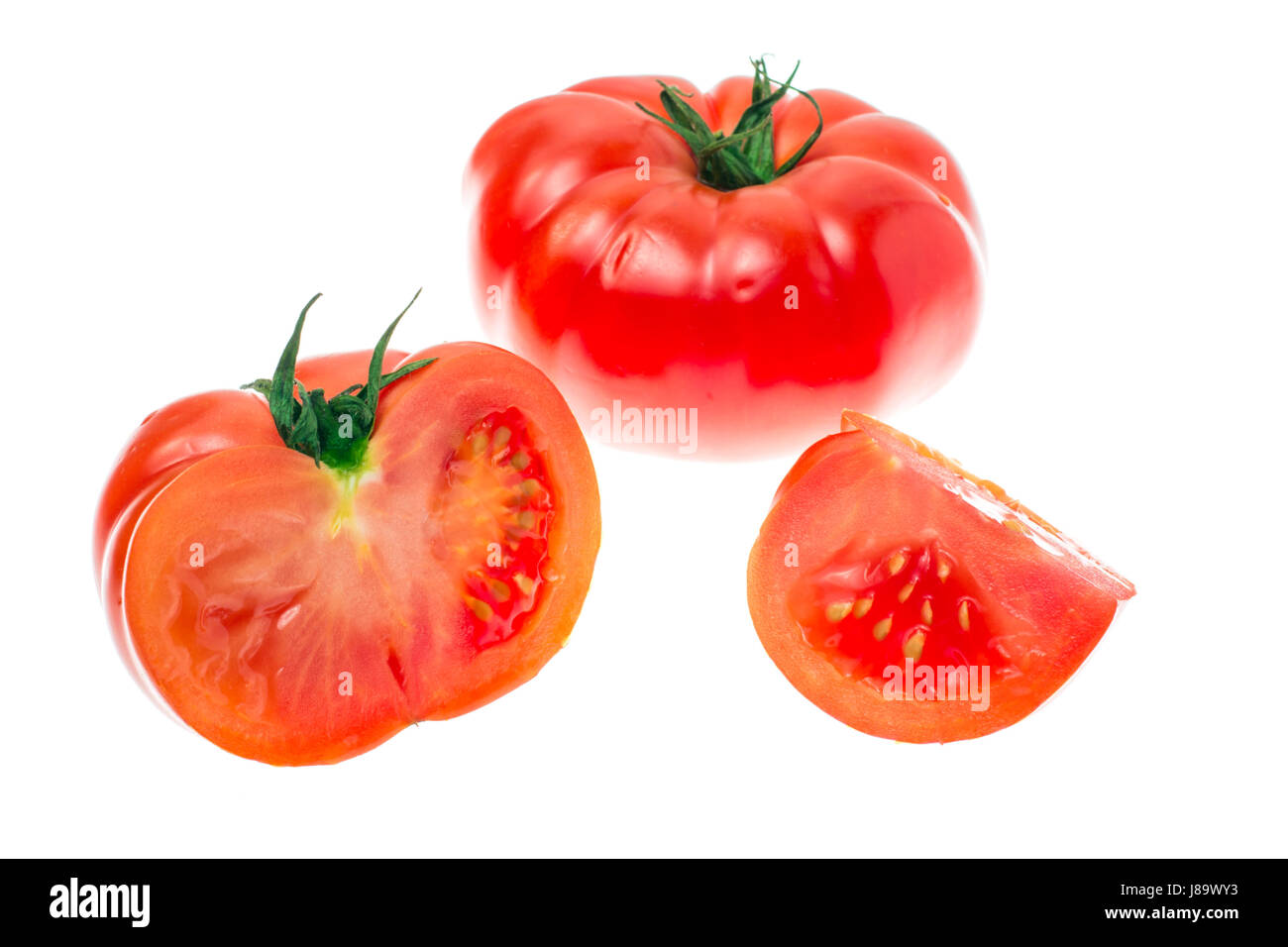 Red tomato isolated on white background Stock Photo - Alamy