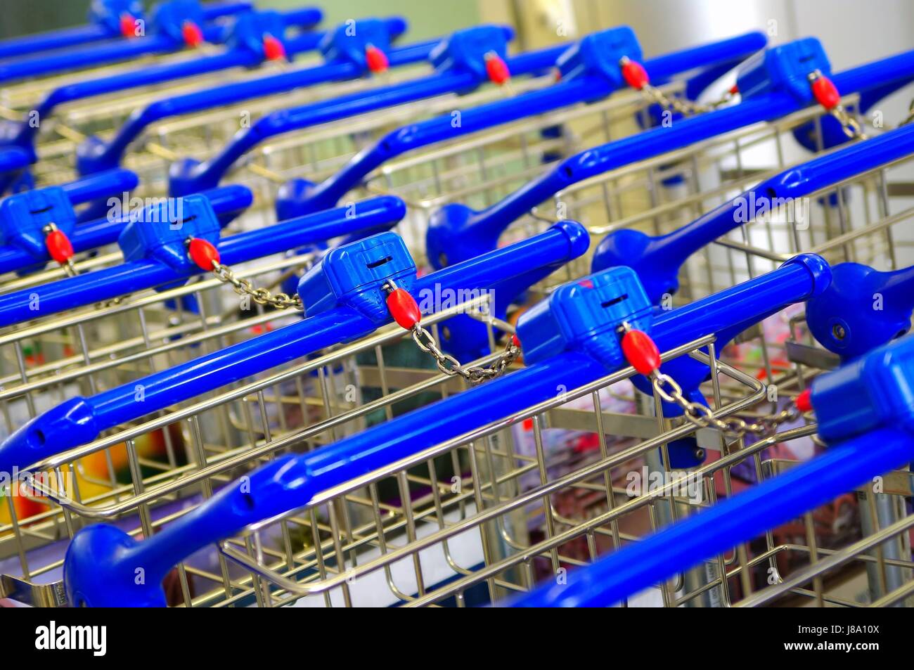 consecutively connected shopping cart Stock Photo - Alamy