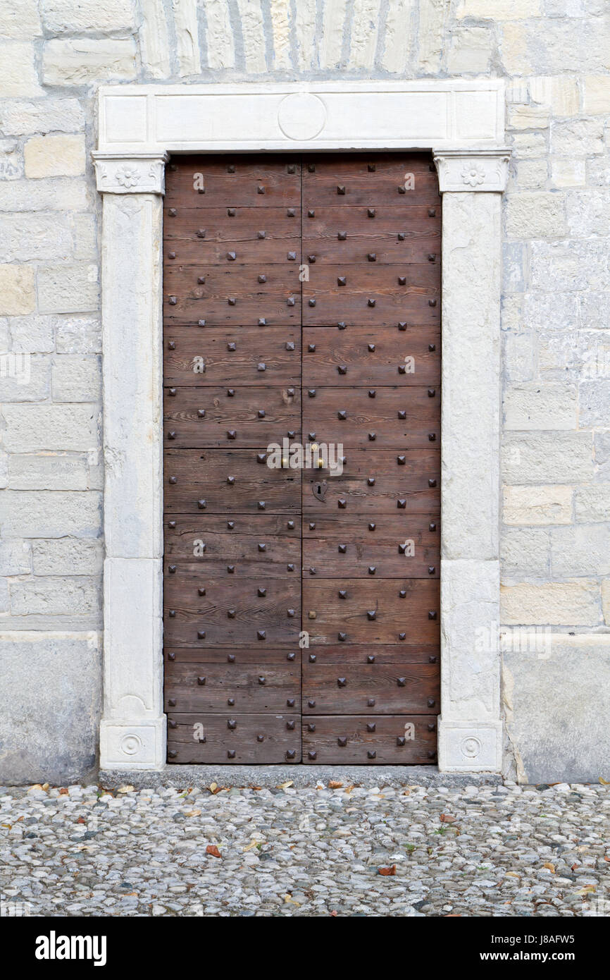 historic church door in italy Stock Photo