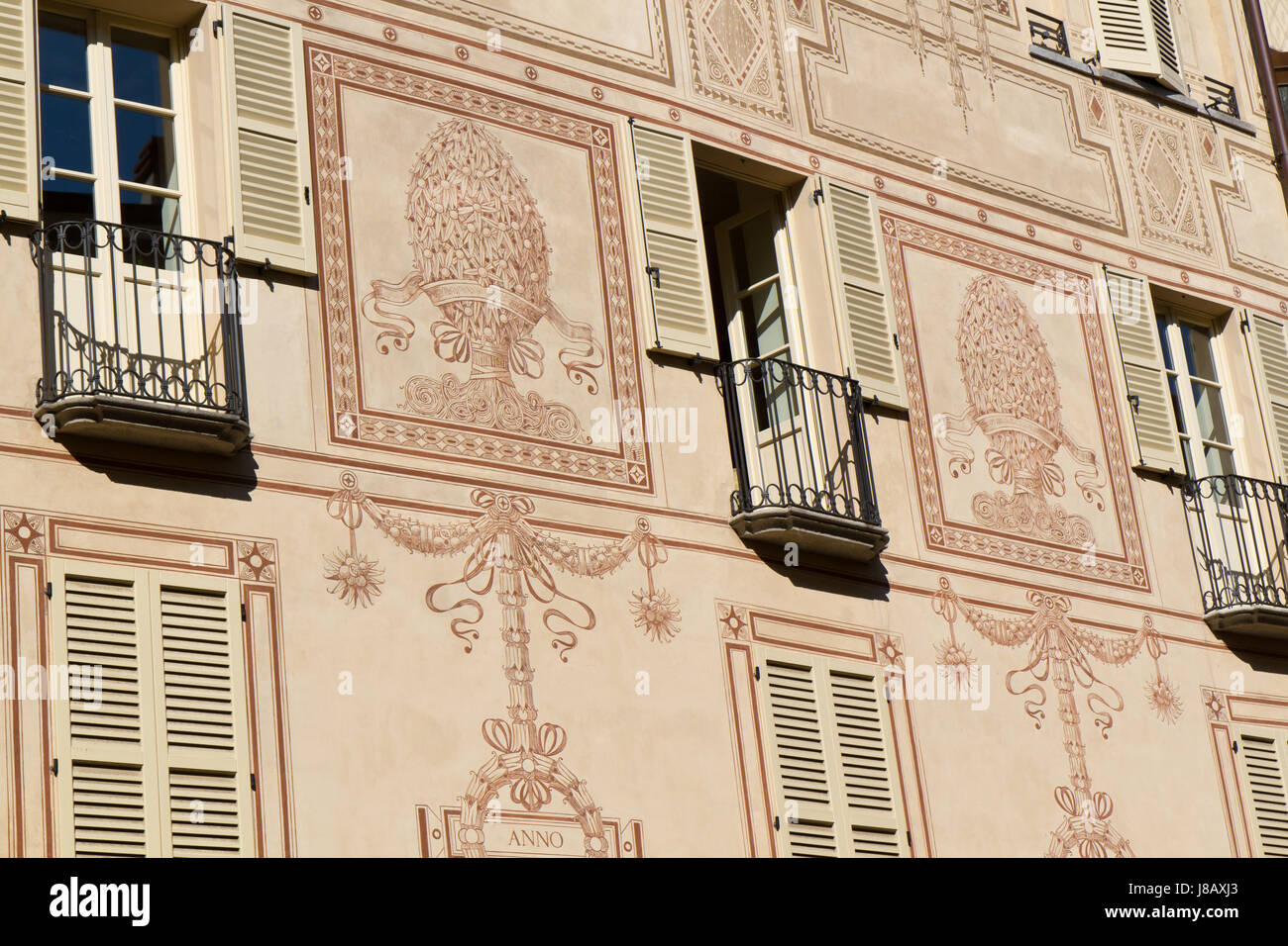 artistically painted house facade in italy Stock Photo