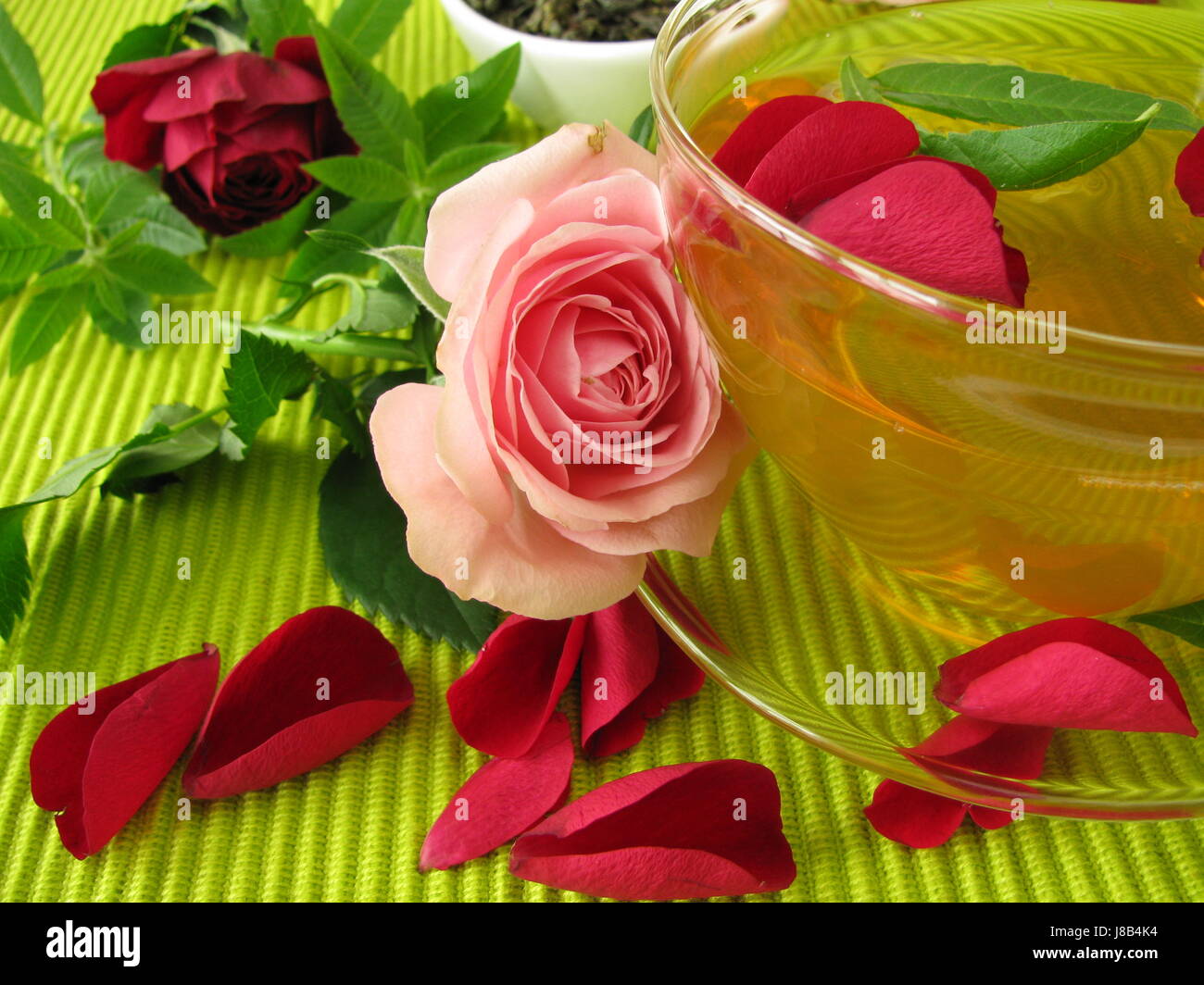 green tea with rose flowers and lemon verbena Stock Photo