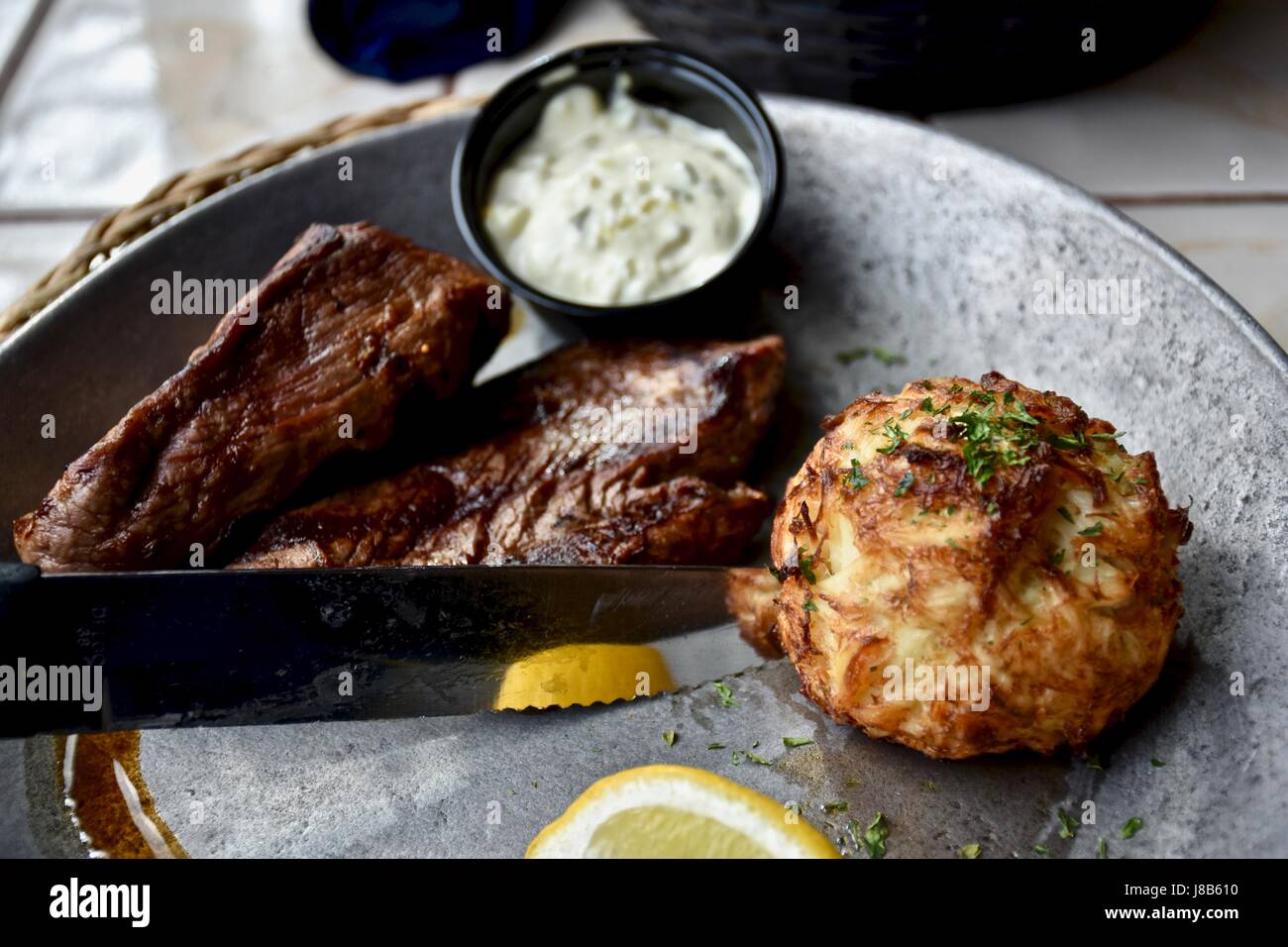 Steak and crab cake dinner Stock Photo Alamy