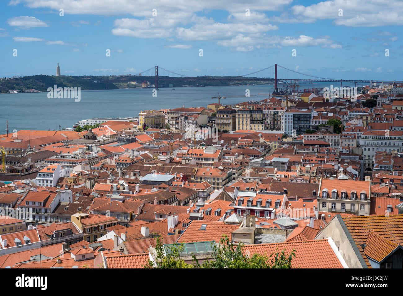 Aerial view of Lisbon city and Tagus River with red roofs and landmarks Stock Photo