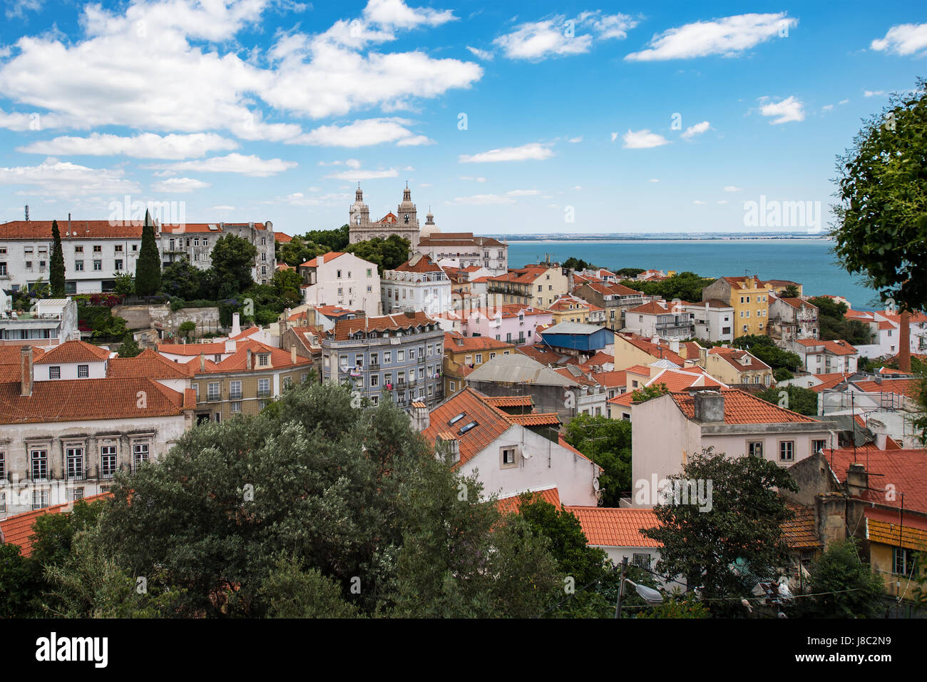 Aerial view of Lisbon city and Tagus River with red roofs and landmarks Stock Photo